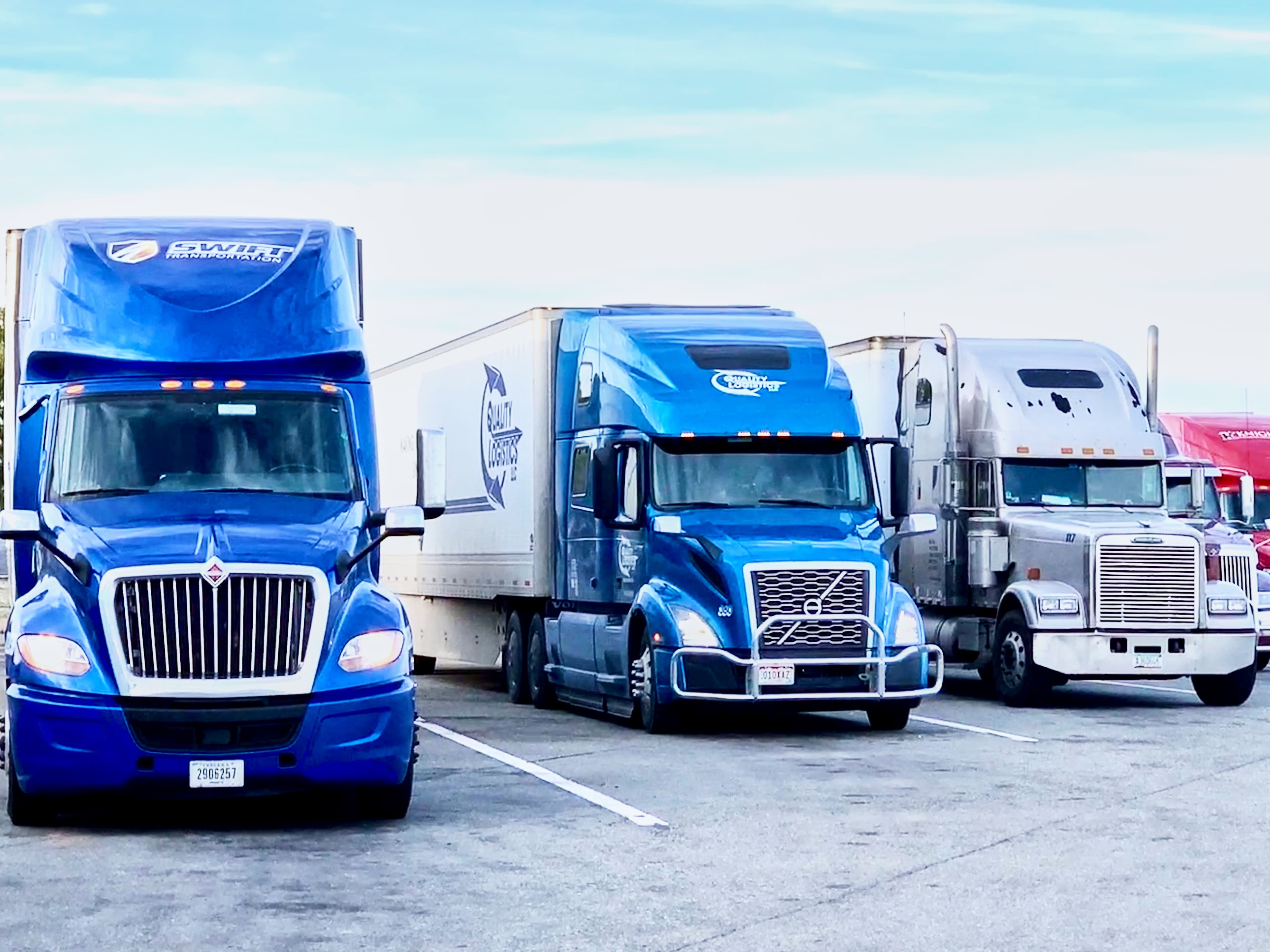 4 parked trucks