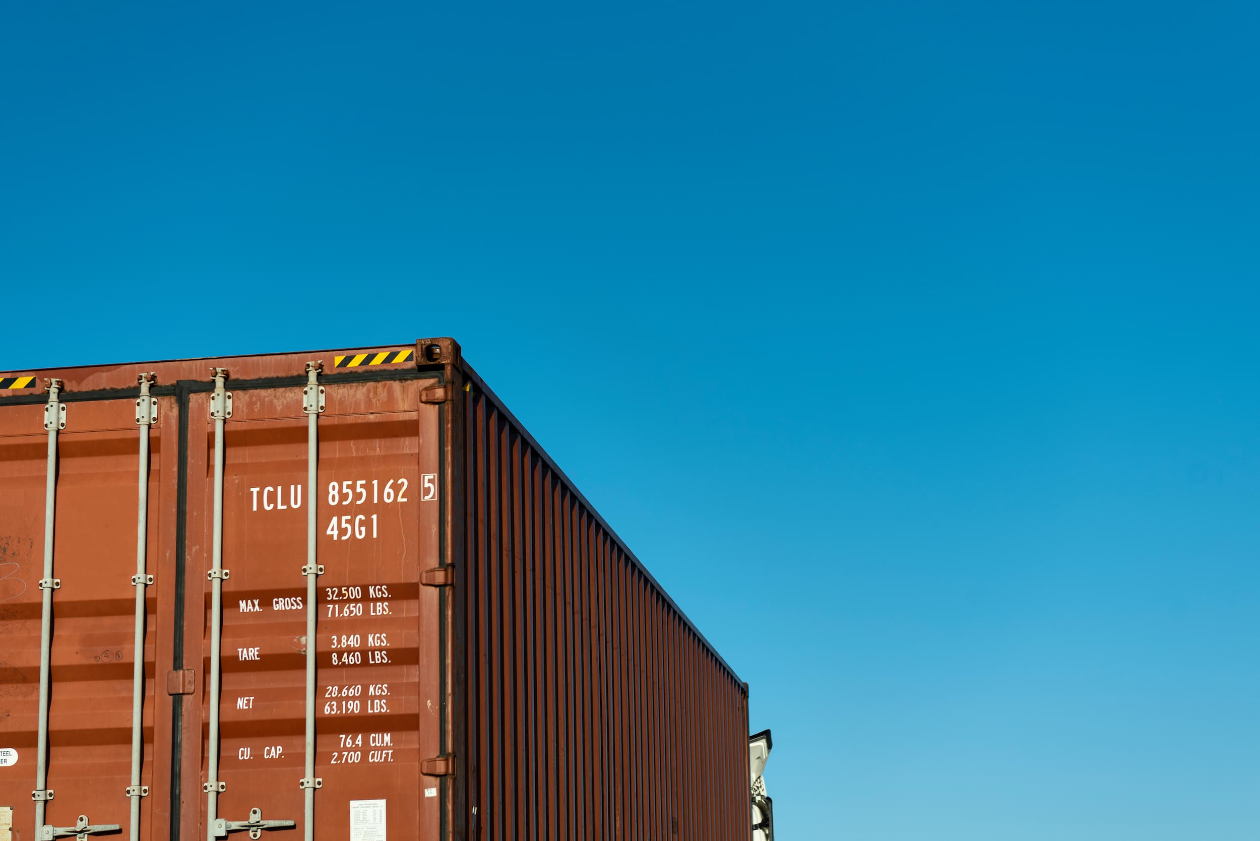 the back of a truck against a blue sky