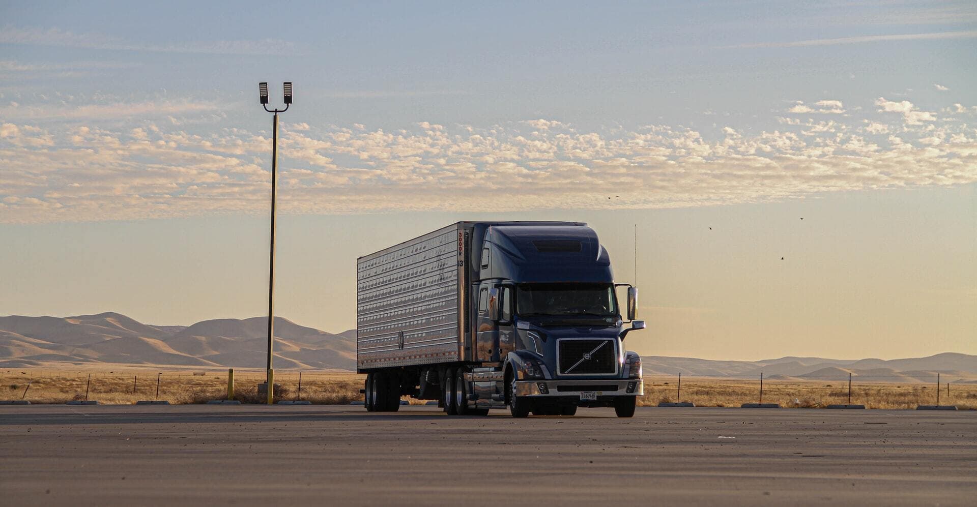 Truck outside with a sunset backdrop